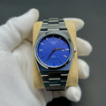 GW-1853 watch silver band blue dial professional shot on beige cushion