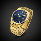 Tissot PRX Powermatic 80 gold blue dial angle view dark grey background